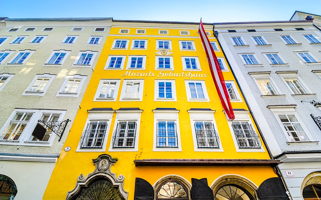 Birthplace of Mozart, yellow building facade in Salzburg, Austria.