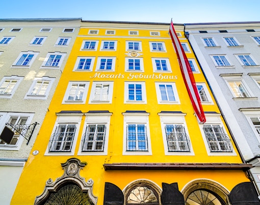 Birthplace of Mozart, yellow building facade in Salzburg, Austria.