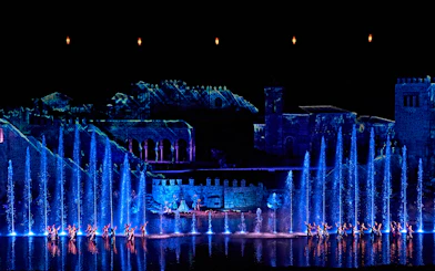 Dancers perform with illuminated fountains at The Dream of Toledo show in Spain.