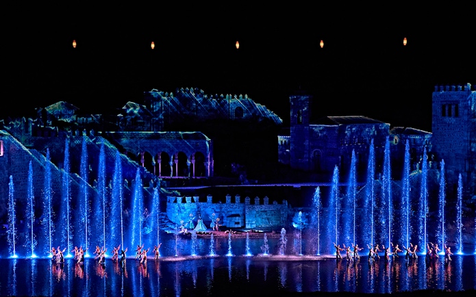 Dancers perform with illuminated fountains at The Dream of Toledo show in Spain.