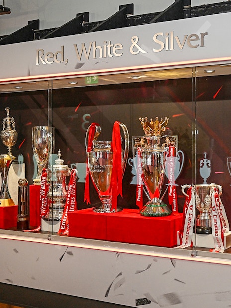 Trophies displayed at Liverpool FC Museum during stadium tour.