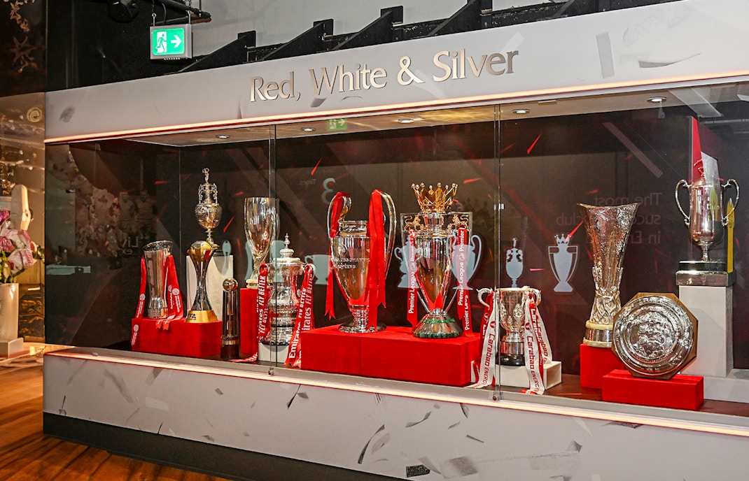 Trophies displayed at Liverpool FC Museum during stadium tour.