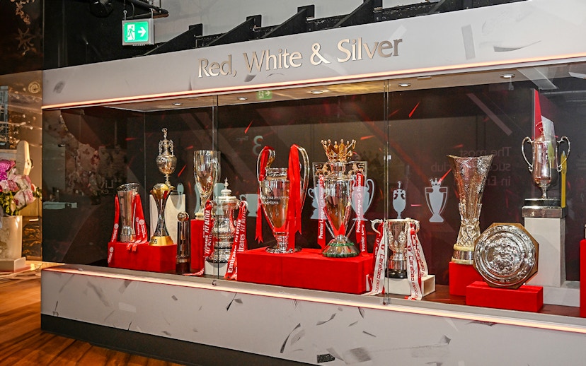 Trophies displayed at Liverpool FC Museum during stadium tour.