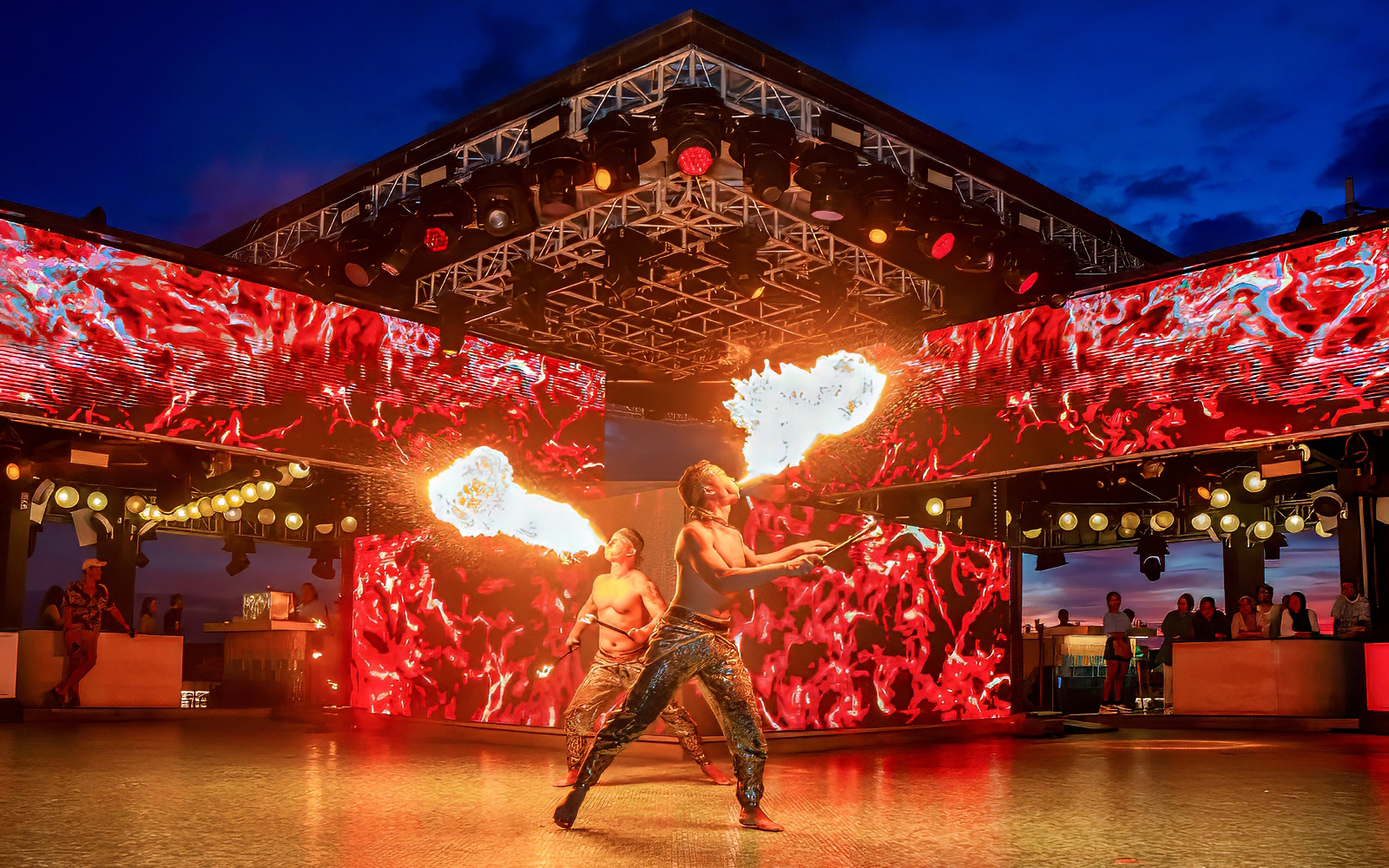 Fire performers at Atlas Beach Club, Bali during a cultural show.