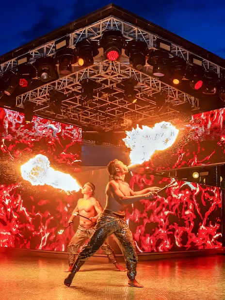 Fire performers at Atlas Beach Club, Bali during a cultural show.