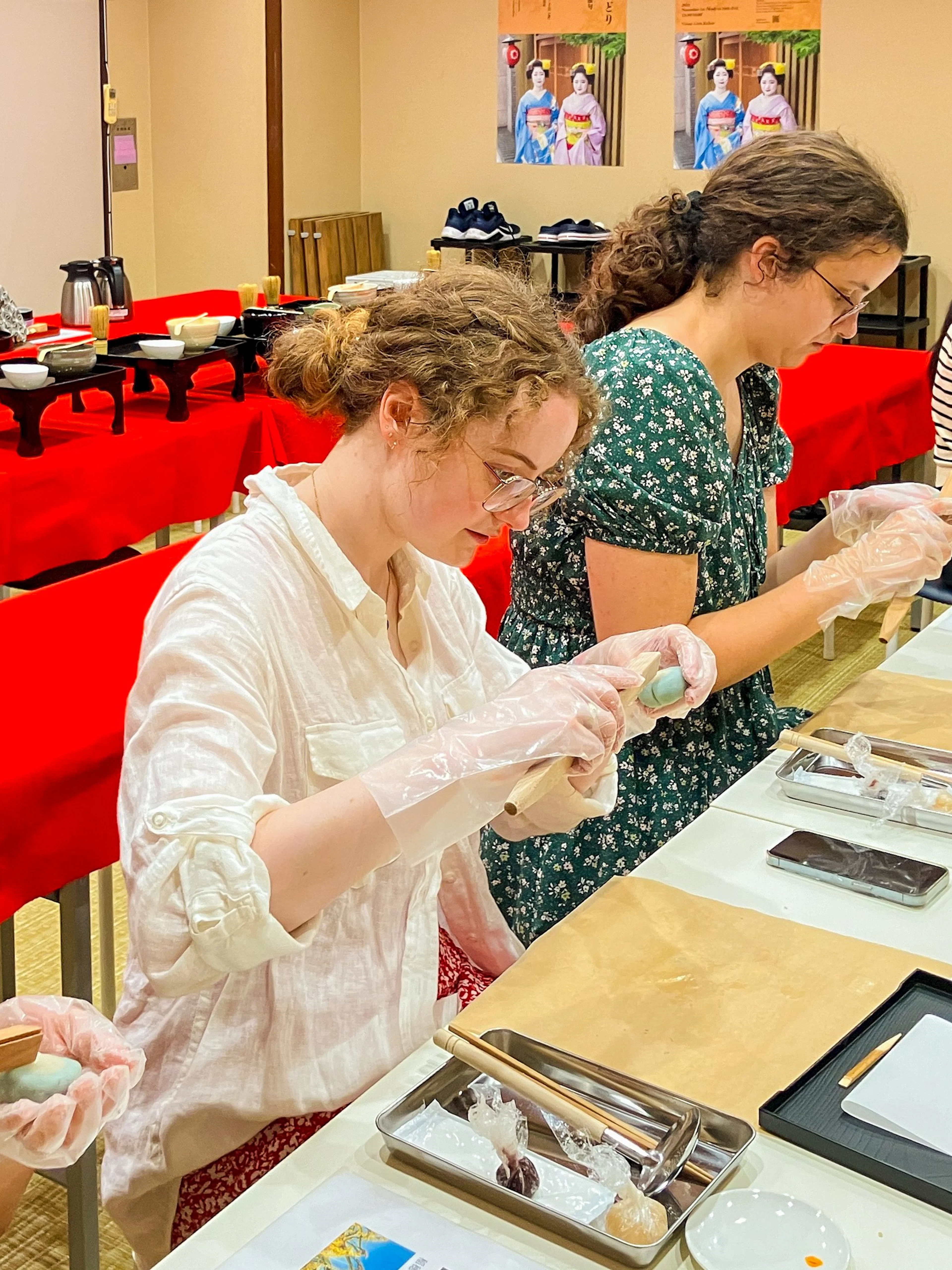 Participants crafting traditional Japanese sweets in a workshop setting.
