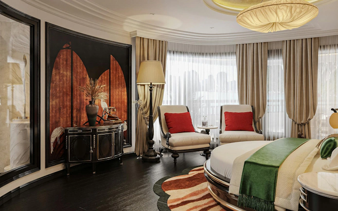 Luxury cabin interior on La Casta Star Cruise, Lan Ha Bay, featuring elegant decor and seating area.