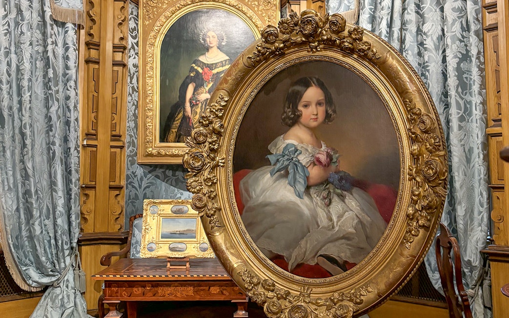 Miramare Castle paintings featuring portraits in ornate frames.