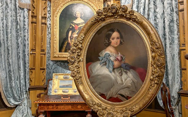 Miramare Castle paintings featuring portraits in ornate frames.