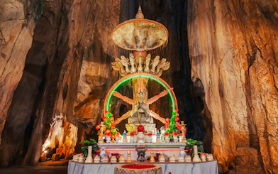 Altar with statue inside a cave at Sơn Trà Peninsula, Đà Nẵng, Vietnam.
