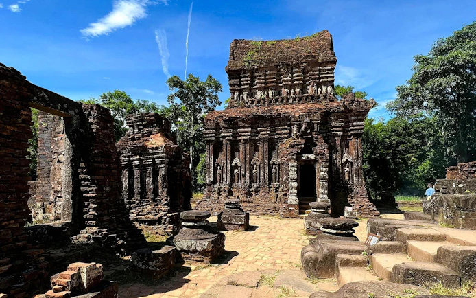 Mỹ Sơn Sanctuary ancient Hindu temple ruins in central Vietnam surrounded by lush greenery.