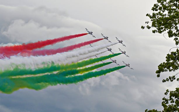 Aerobatic planes with colored smoke trails at Formula 1 Gran Premio del Made in Italy e dell'Emilia-Romagna 2023.