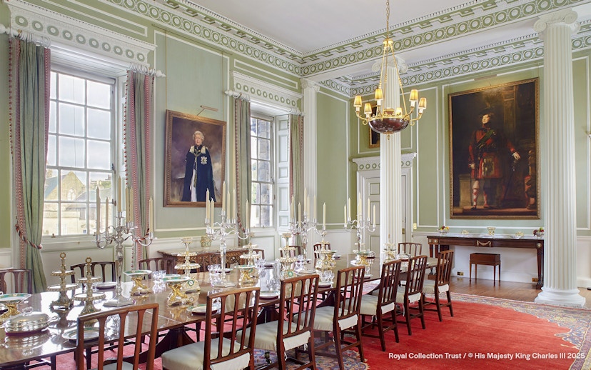 Royal Dining Room at the Palace of Holyroodhouse with ornate table settings and portraits.
