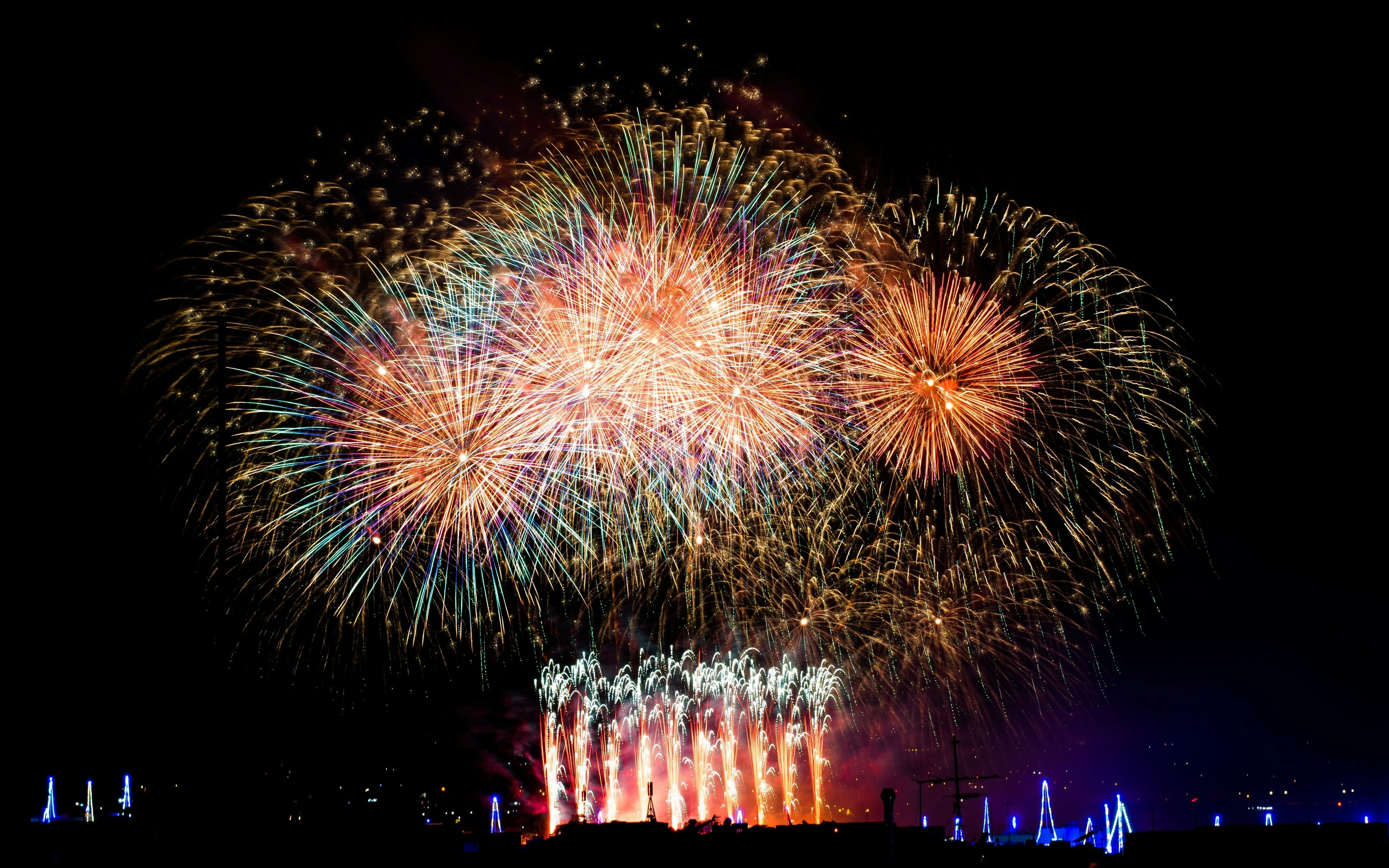 Fireworks over historic skylines