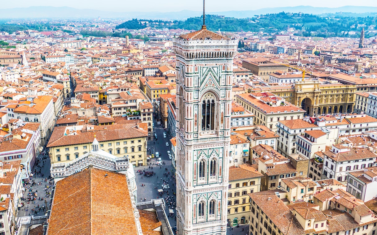 Giotto's Bell Tower in Florence, Italy, overlooking the cityscape.