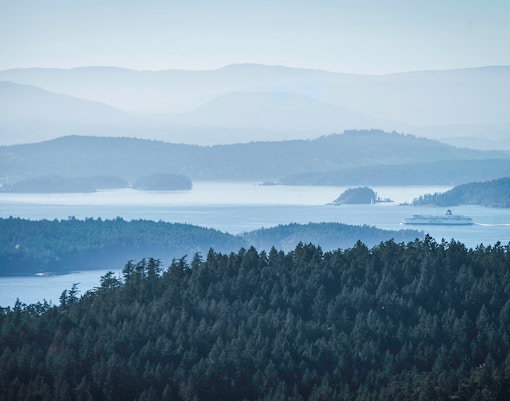 Misty morning view of islands and ocean from Pender Island, Gulf Islands, Vancouver.