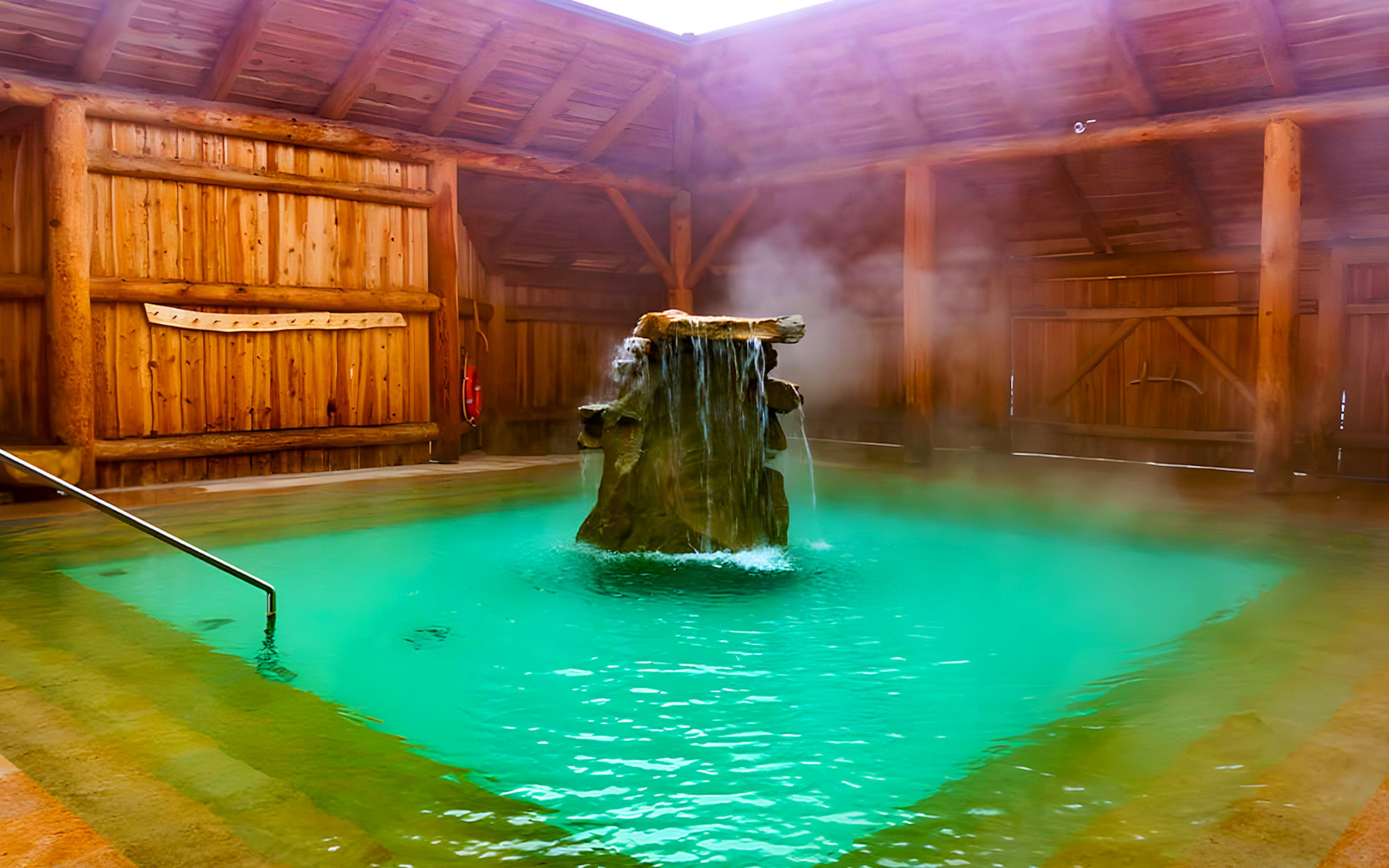 Goracy Potok Thermal Bath with steaming water and wooden interior in Krakow.