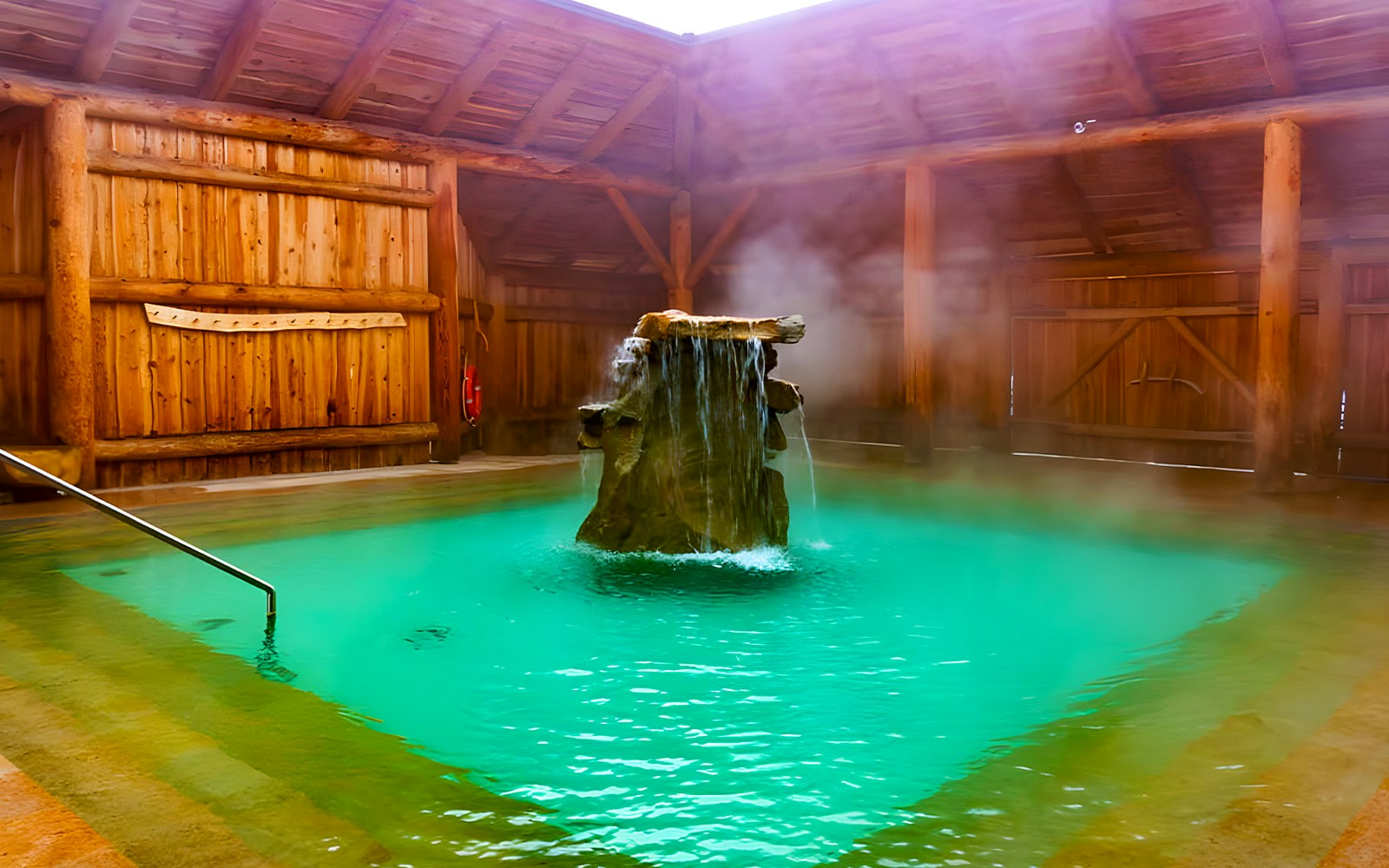 Goracy Potok Thermal Bath with steaming water and wooden interior in Krakow.