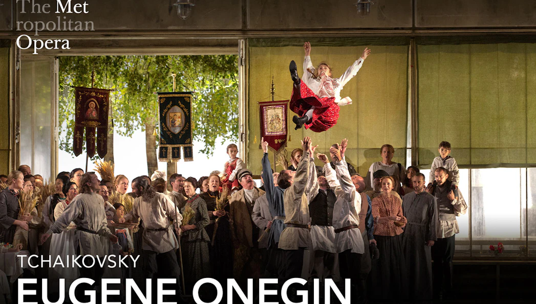 Eugene Onegin cast performing a lively scene at the Metropolitan Opera.