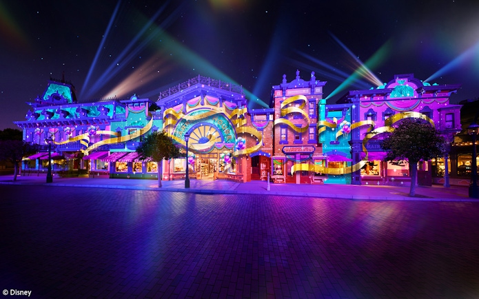 Colorful light display on Main Street for Hong Kong Disneyland's 20th anniversary celebration.