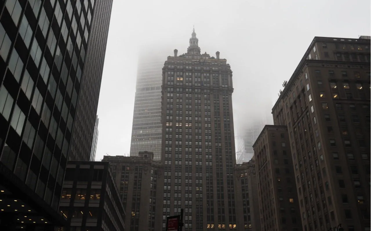 Foggy New York skyscrapers, part of the Mob Hits & Hangouts self-guided city exploration game.