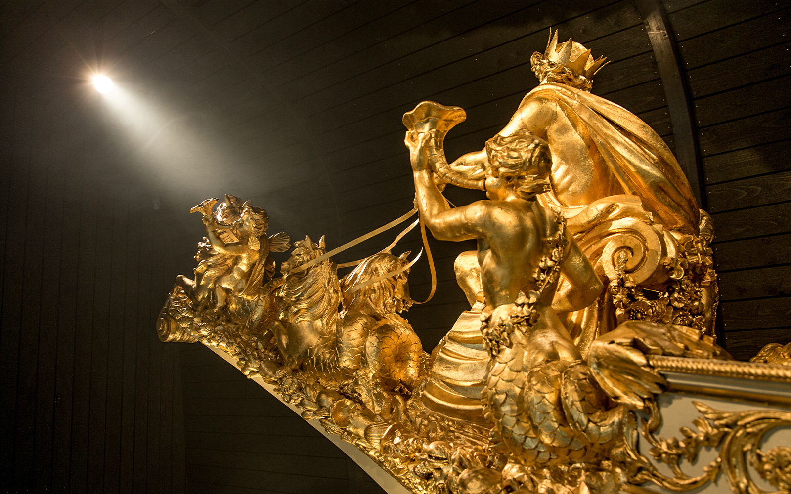 Royal Barge exhibit at The National Maritime Museum, showcasing ornate details and historical significance.