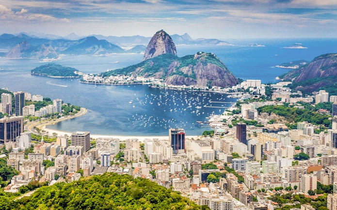 Panoramic view of Rio de Janeiro with Sugarloaf Mountain and Guanabara Bay.