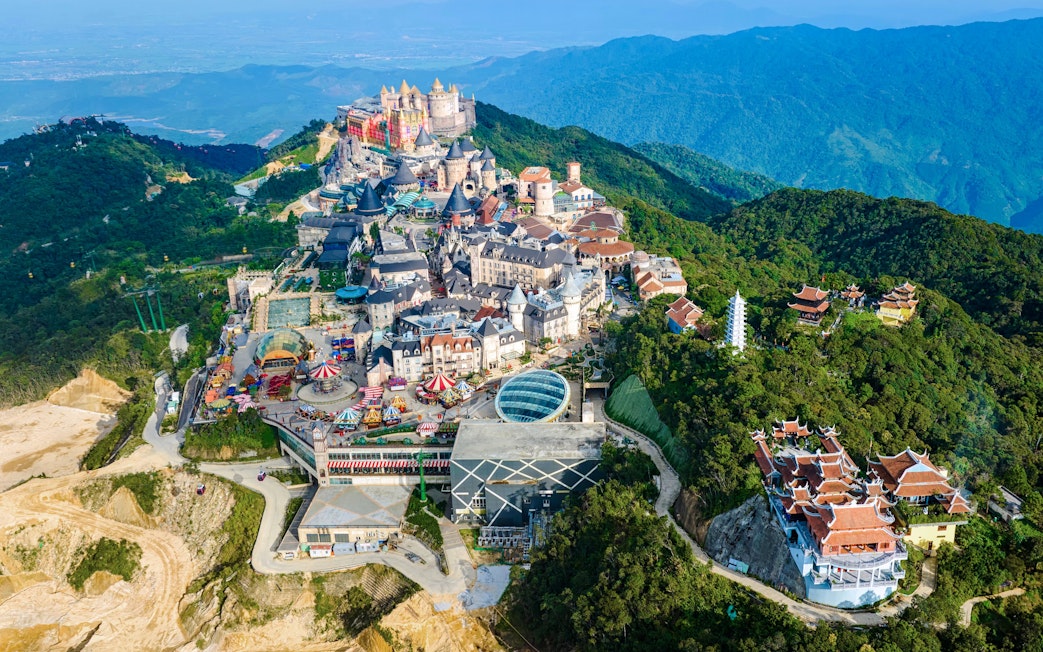 Aerial view of Ba Na Hills, showcasing castles, buildings, and streets in Da Nang, Vietnam.