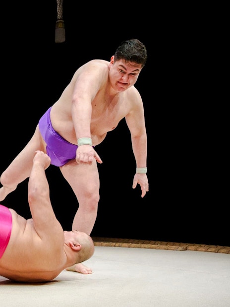 Sumo wrestlers in action during a training session in Osaka.