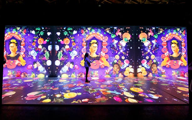 Frida Kahlo immersive exhibition in Vienna with vibrant digital art projections.