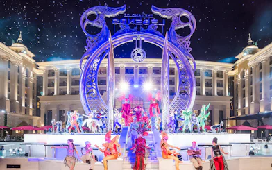 Performers in vibrant costumes at Land of Legend Night Show, Antalya.