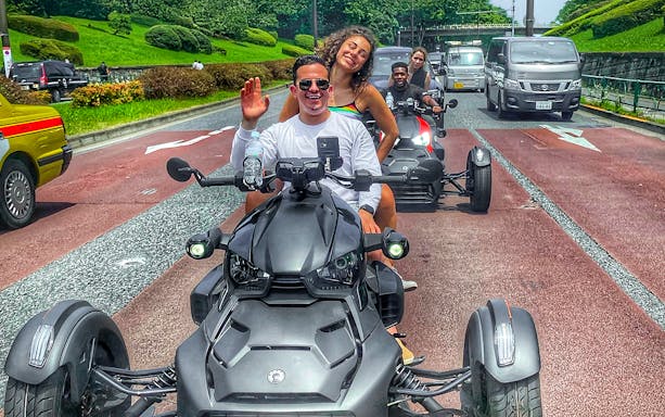 Go-kart riders on Tokyo street near Skytree, enjoying a guided tour.