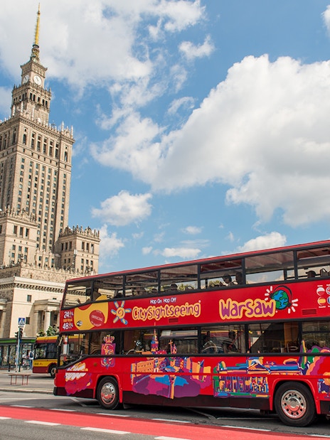 Warsaw hop-on hop-off bus near Palace of Culture and Science.