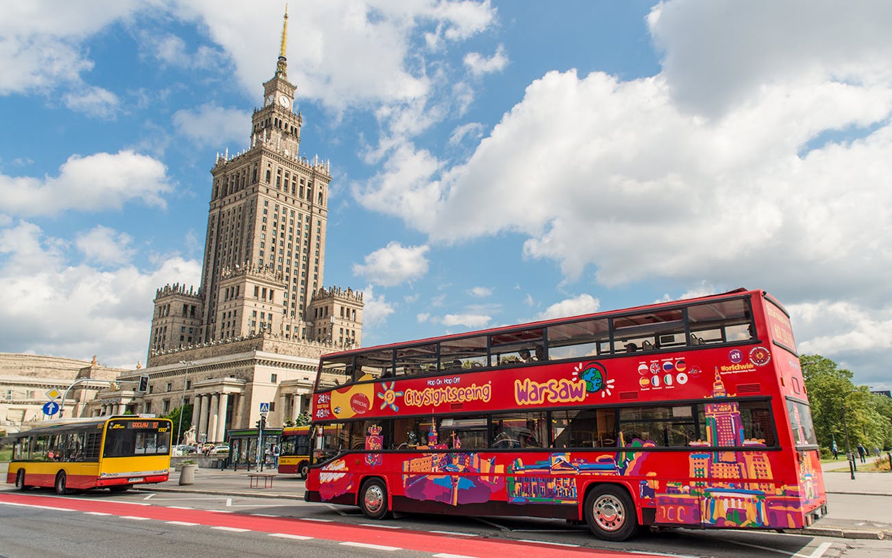 Warsaw hop-on hop-off bus near Palace of Culture and Science.