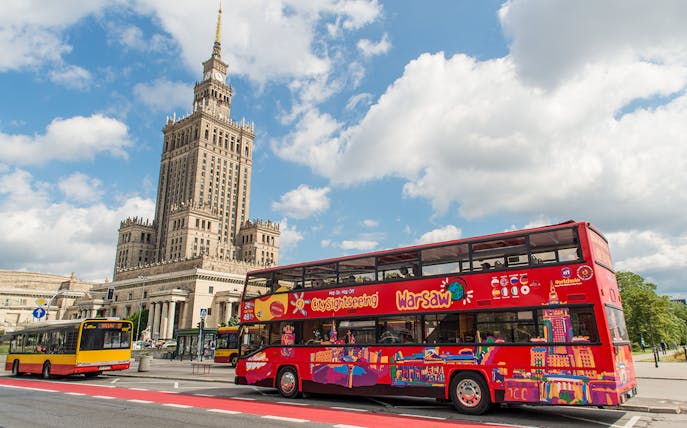 Warsaw hop-on hop-off bus near Palace of Culture and Science.
