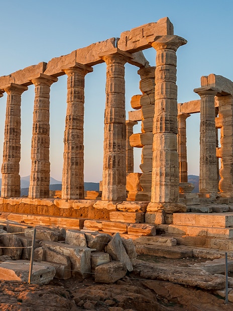 Ruins of Poseidon Temple at Cape Sounion during dawn, Greece.
