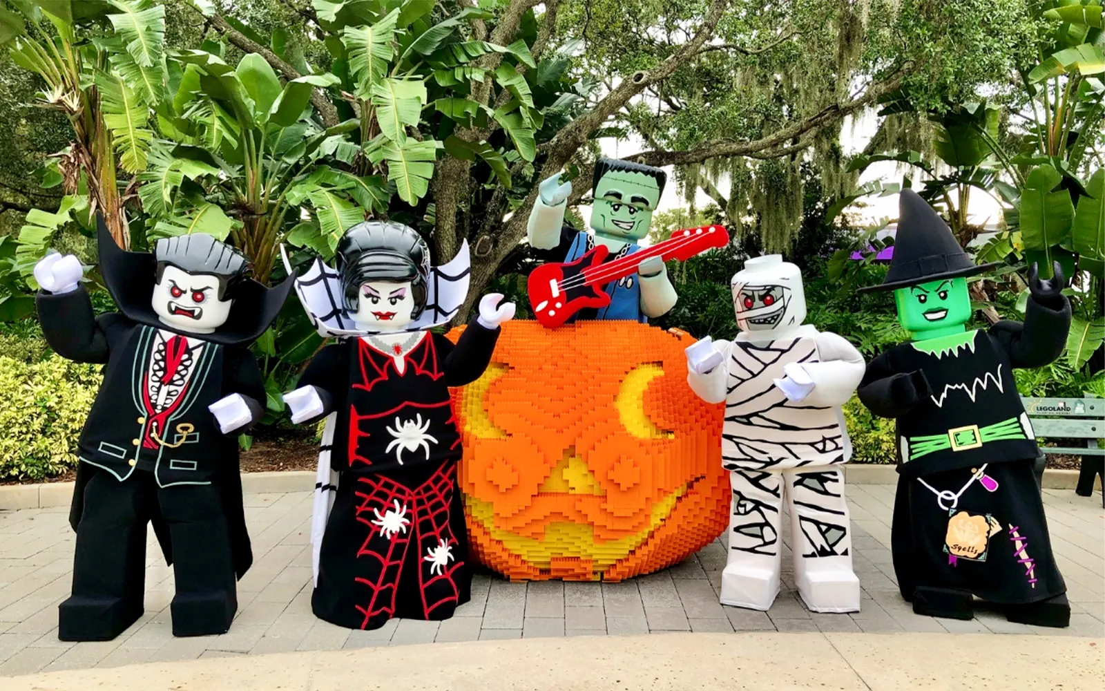 Brick or Treat Street characters in Halloween costumes at Legoland Florida.