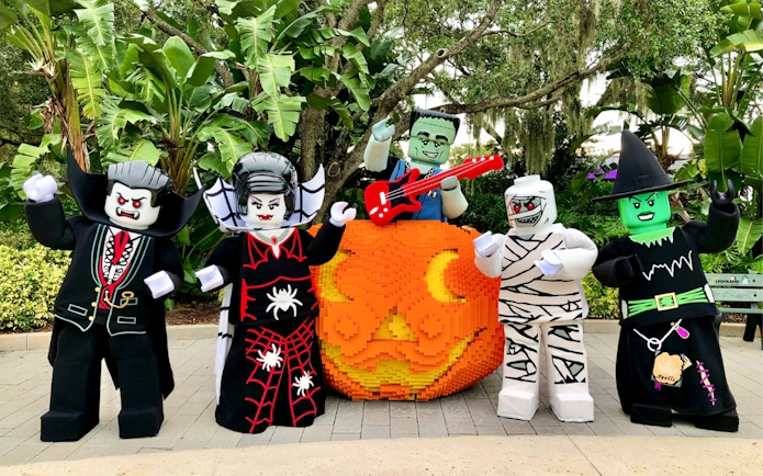 Brick or Treat Street characters in Halloween costumes at Legoland Florida.