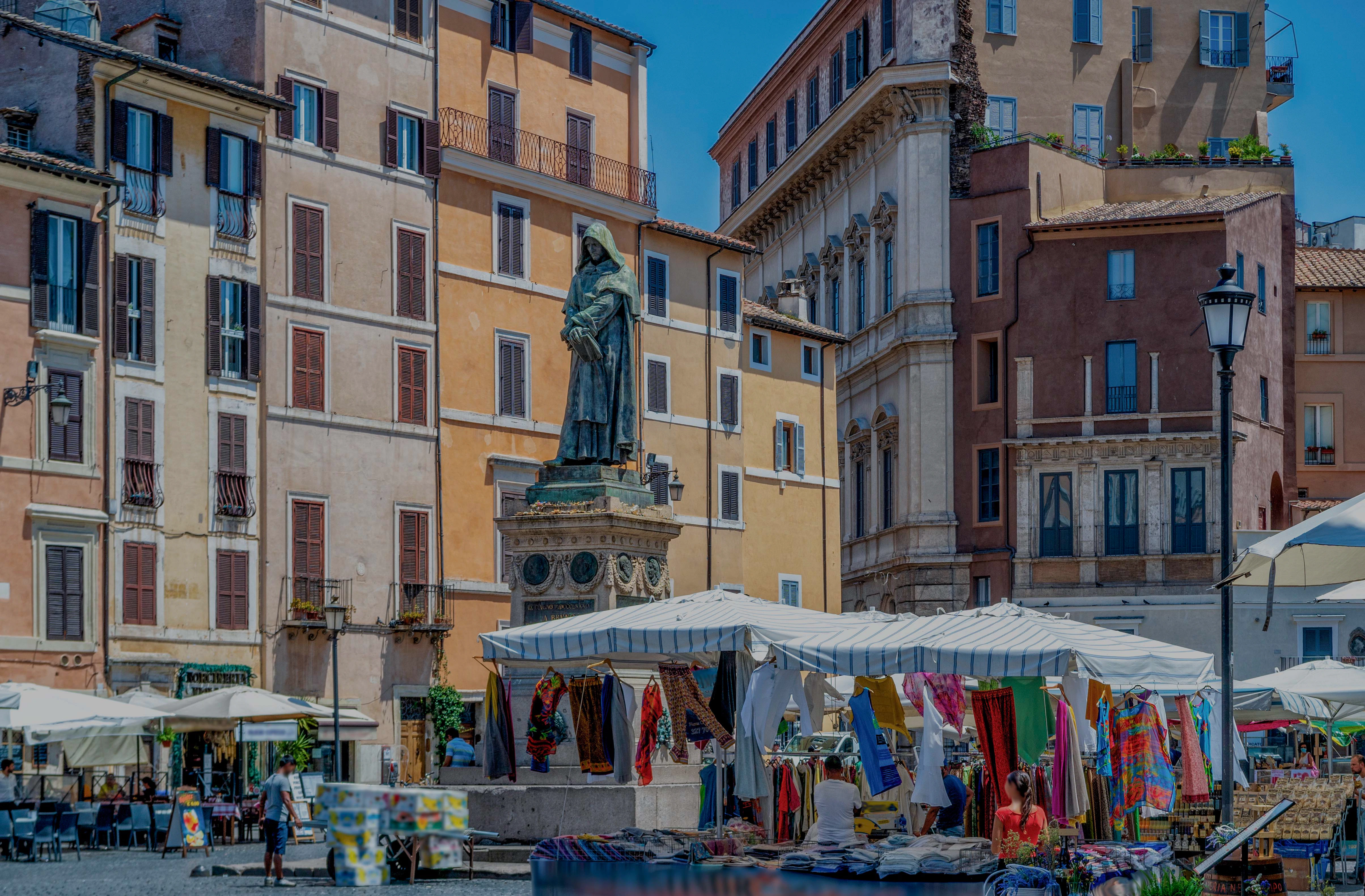 Market stalls and statue in Campo de' Fiori, Rome.