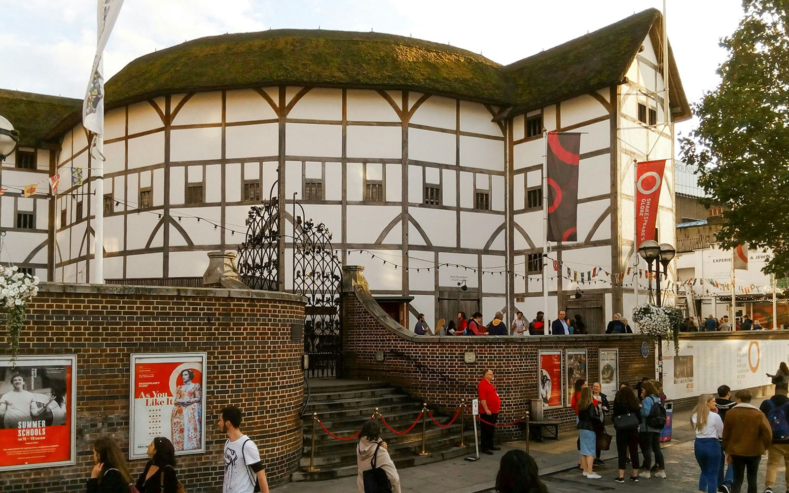 Group of people outside Shakespeare’s Globe Theatre in London.