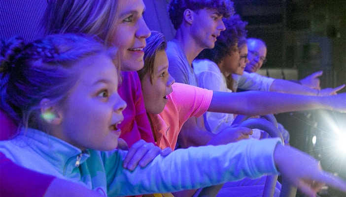 Aerial view of Amsterdam with This Is Holland observation wheel in the foreground.