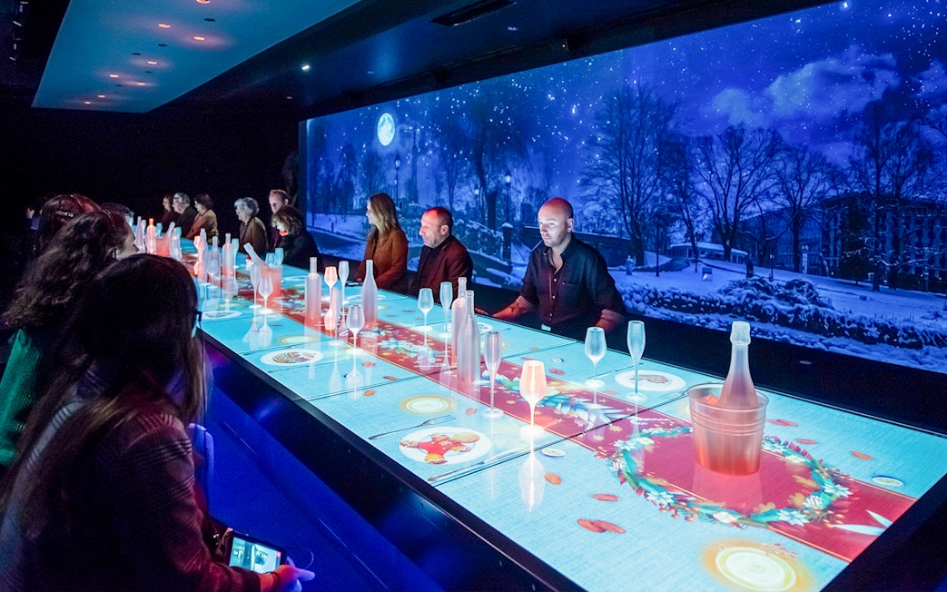 Customers participating in a wine tasting experience at Cite du Vin, Bordeaux.