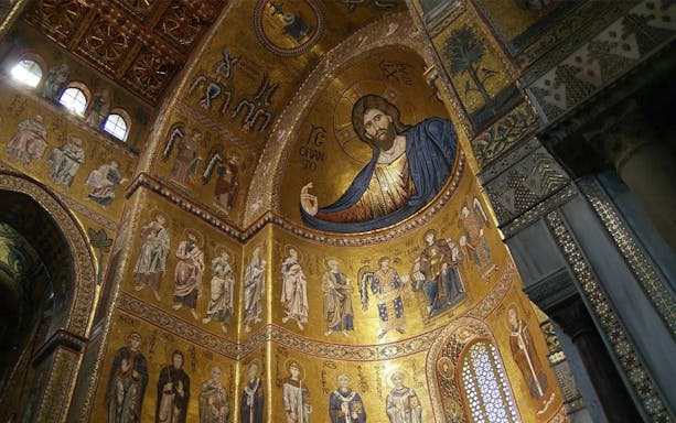 Mosaics in Monreale Cathedral, Sicily, depicting religious figures and scenes.