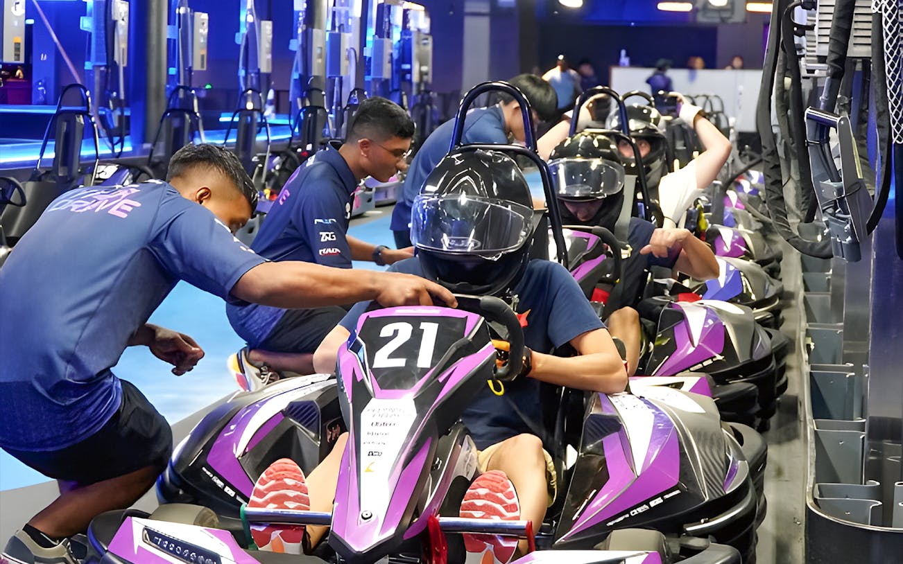 Go-kart racers preparing for HyperDrive experience.