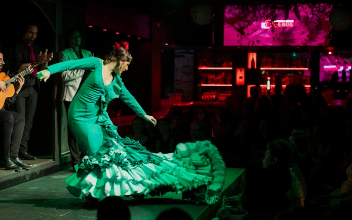 Flamenco dancer performing at El Duende by Tablao Cordobes show in Barcelona.