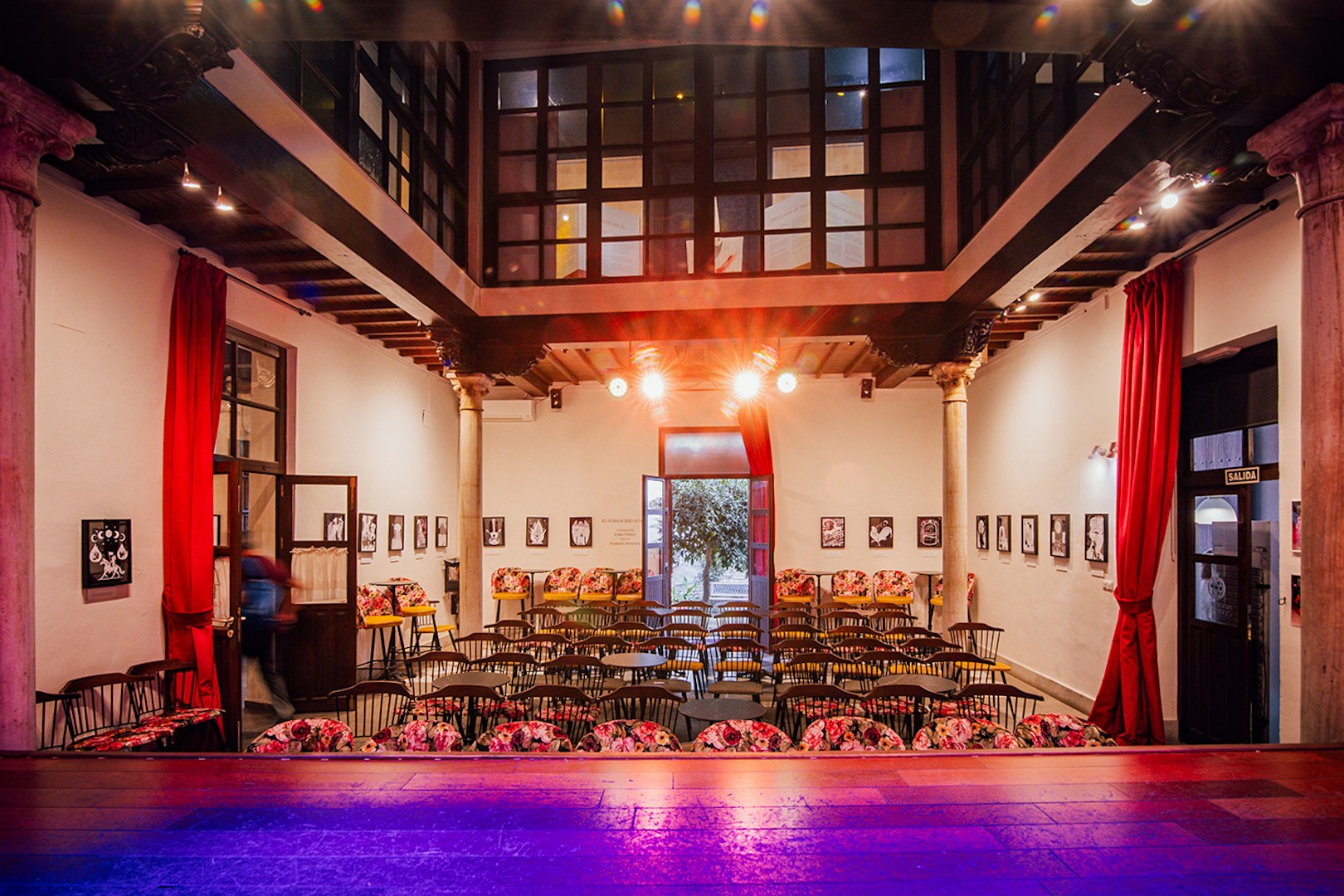 Palacio Flamenco Granada interior with stage and seating for flamenco show.