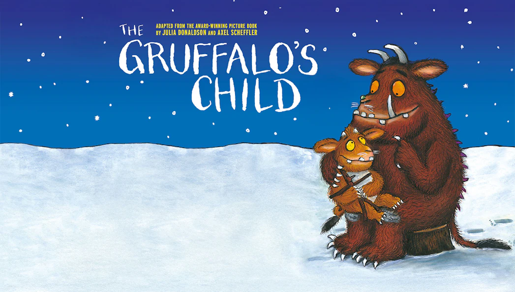 Gruffalo and child in snowy landscape under starry sky.