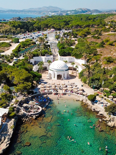 Aerial view of Kallithea Springs in Rhodos, Greece, showing the domed building and beach area.