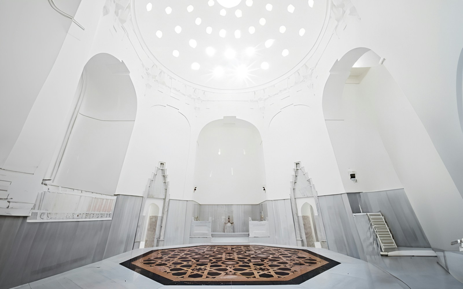 Hurrem Sultan Hamam interior with ornate marble basin in Istanbul.