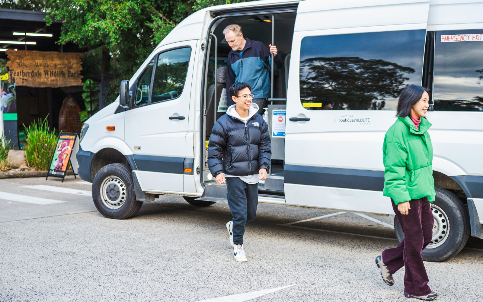 Visitors exiting a tour van at Featherdale Wildlife Park, en route to Blue Mountains.
